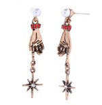 Load image into Gallery viewer, Hand and Star Earrings
